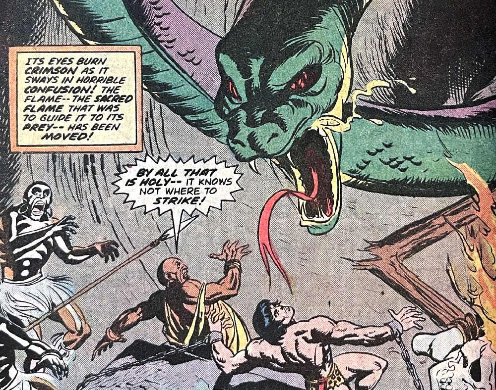 Portion of a mid-issue splash page from Tarzan Annual issue number 2. A giant snake is attacking Tarzan and two other guys. One of the guys is painted up like a skeleton. Caption reads, “Its eyes burn crimson as it sways in horrible confusion! The flame — the sacred flame that was to guide it to its prey — has been moved!” The guy not painted up like a skeleton says, “By all that is holy — it knows not where to strike!”